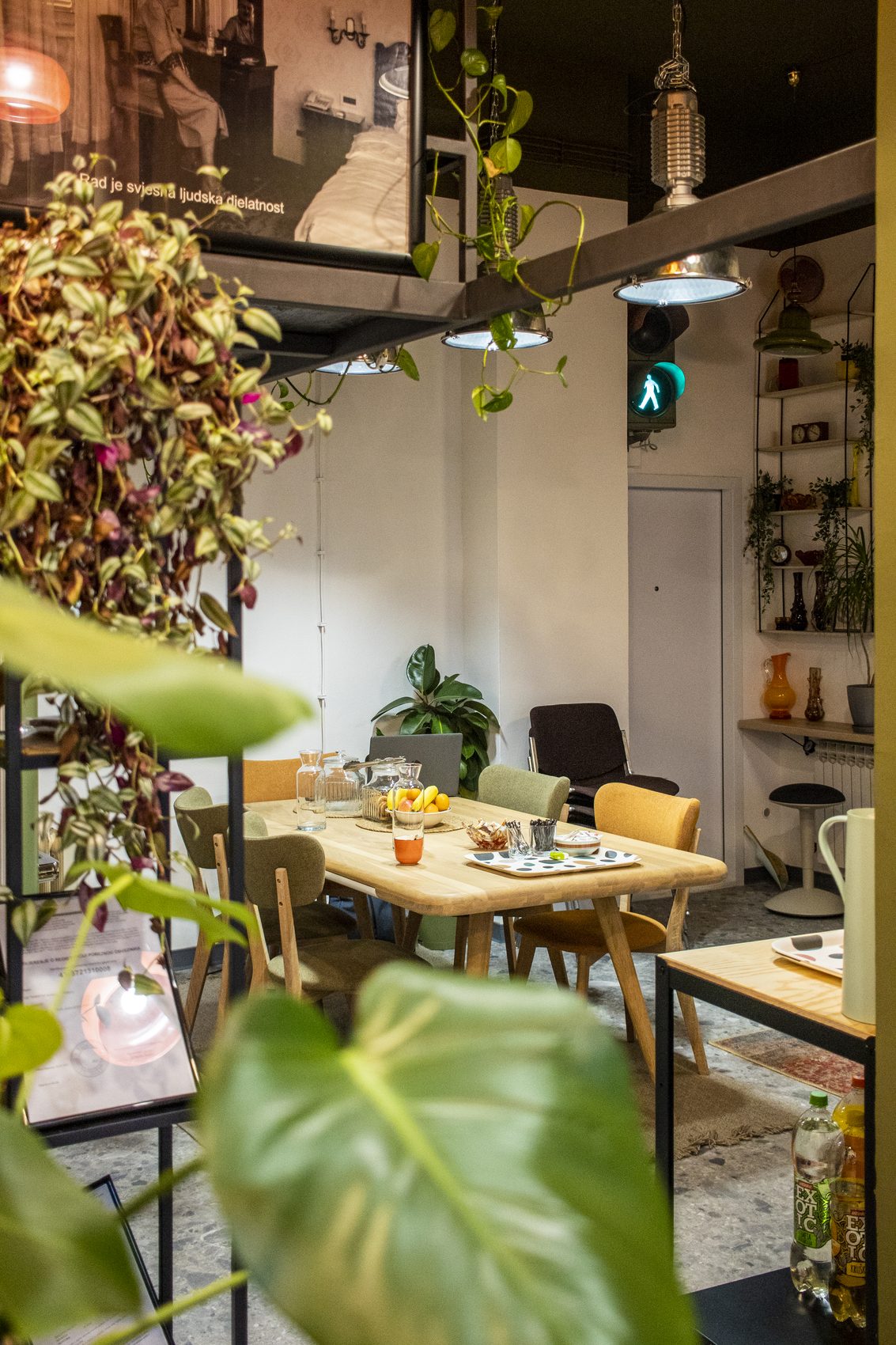 Corner with tables and hanging plants
