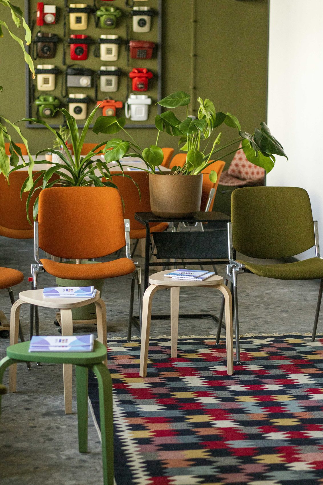 Colourful rug and work chairs at SKRIPTA IdeaLab